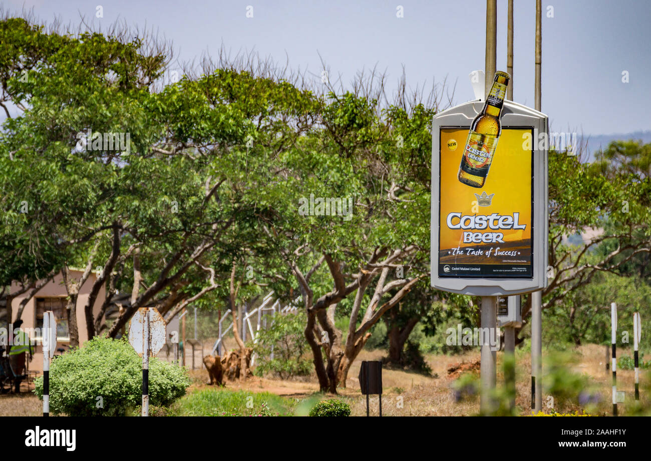 Panneau publicitaire pour Castel Beer, au Malawi. "Le goût du succès" Banque D'Images