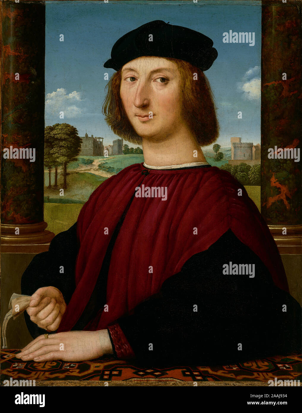 Portrait d'un jeune homme en rouge ; cercle de Raphael (Raffaello Sanzio), Italien (1483 - 1520) ; Italie ; environ 1505 ; Huile sur panneau, 67,3 × 52,7 cm (26 1/2 x 20 3/4 in.) ; 78.PB.364 Banque D'Images