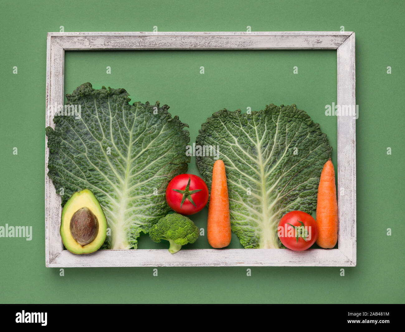 Les légumes bio photo avec du vert sur la frontière Banque D'Images