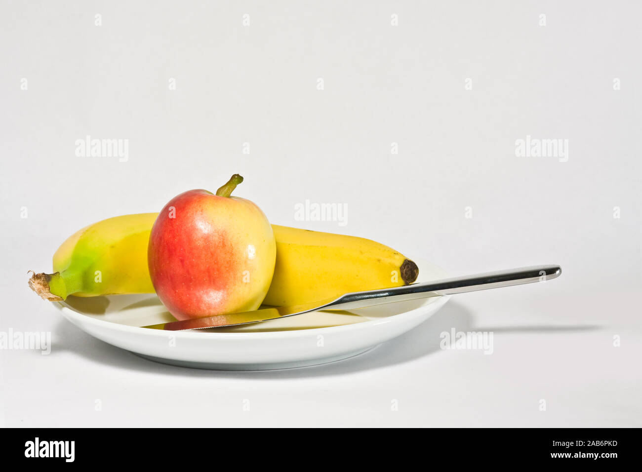 Une photographie d'une pomme et une banane Banque D'Images