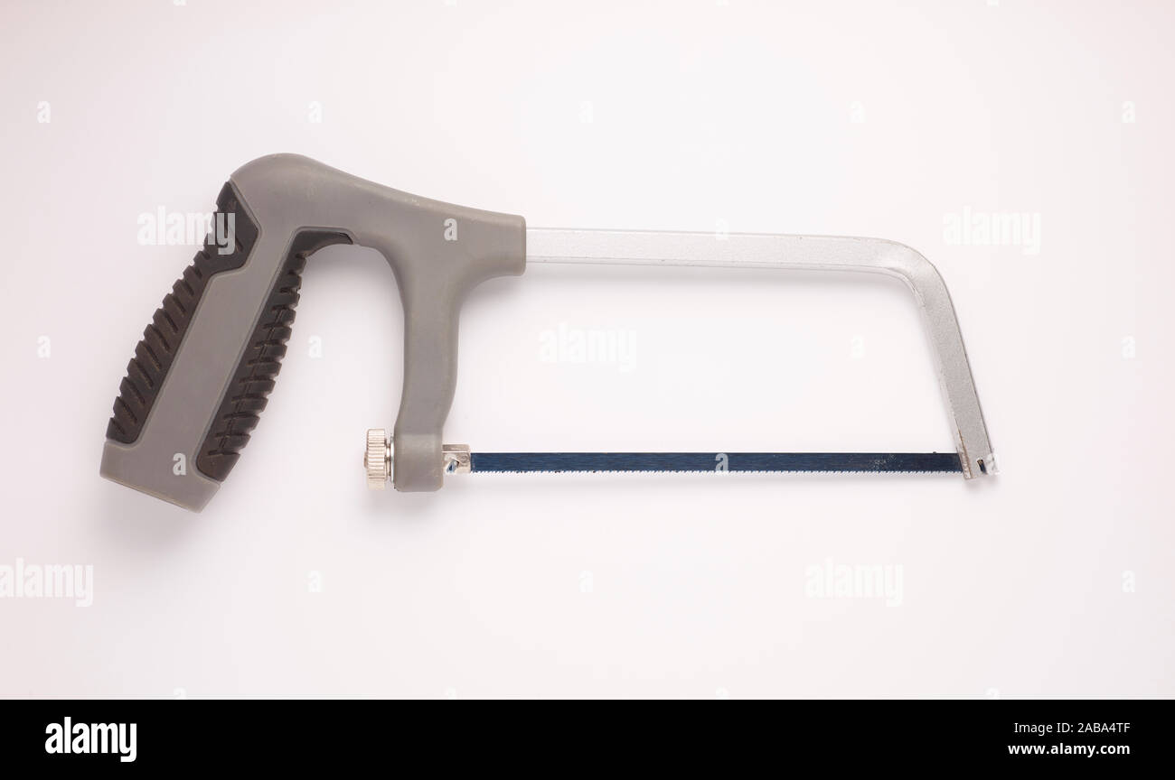 Scie à métaux Junior sur un fond blanc Banque D'Images