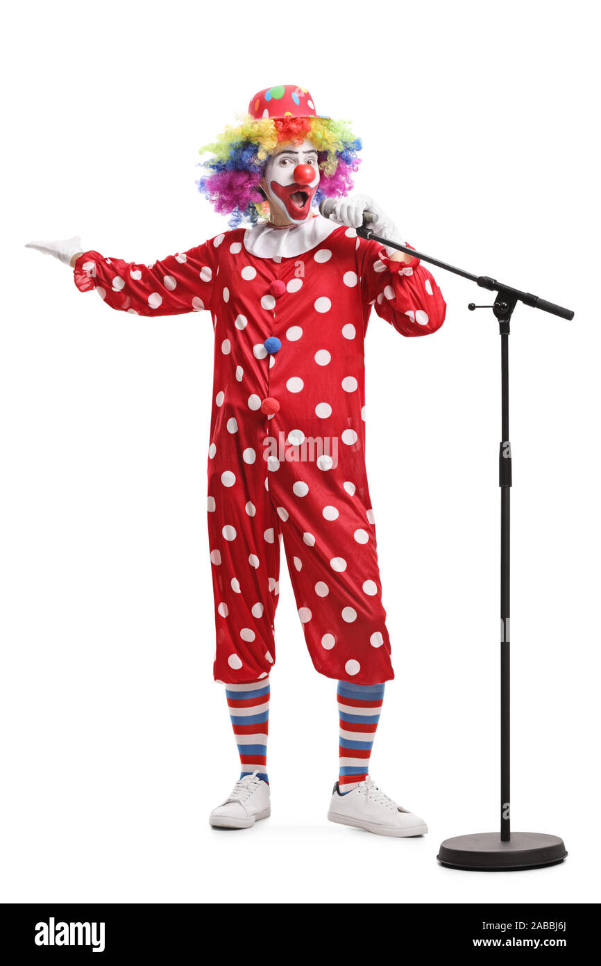 Portrait d'un drôle de clown avec un microphone isolé sur fond blanc Banque D'Images