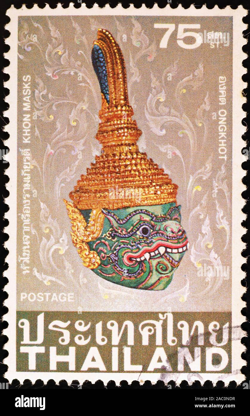 Masque thaï reproduisant un démon sur timbre-poste Banque D'Images