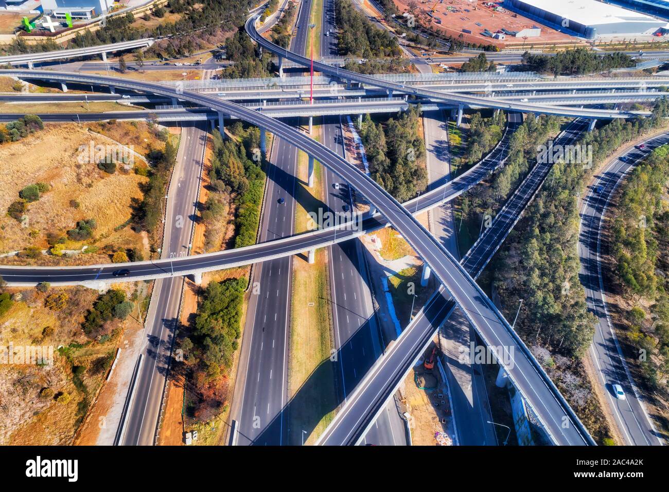 Light Horse échanges entre les autoroutes M2 et M4 dans l'ouest de Sydney - la plus complexe et multi-niveau intersection. Vue aérienne des voies plus, b Banque D'Images
