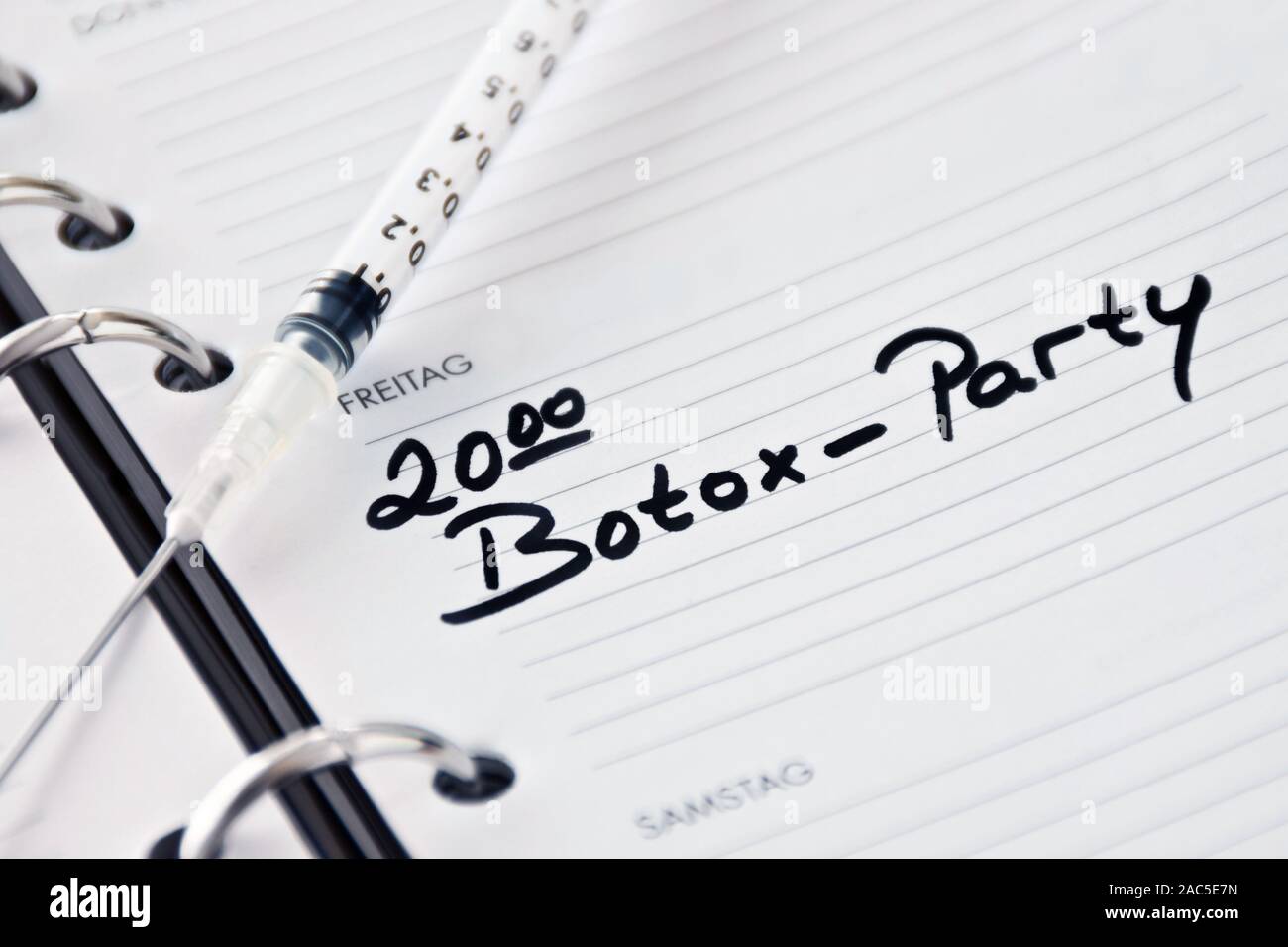 Partie de Botox et calendrier allemand Banque D'Images