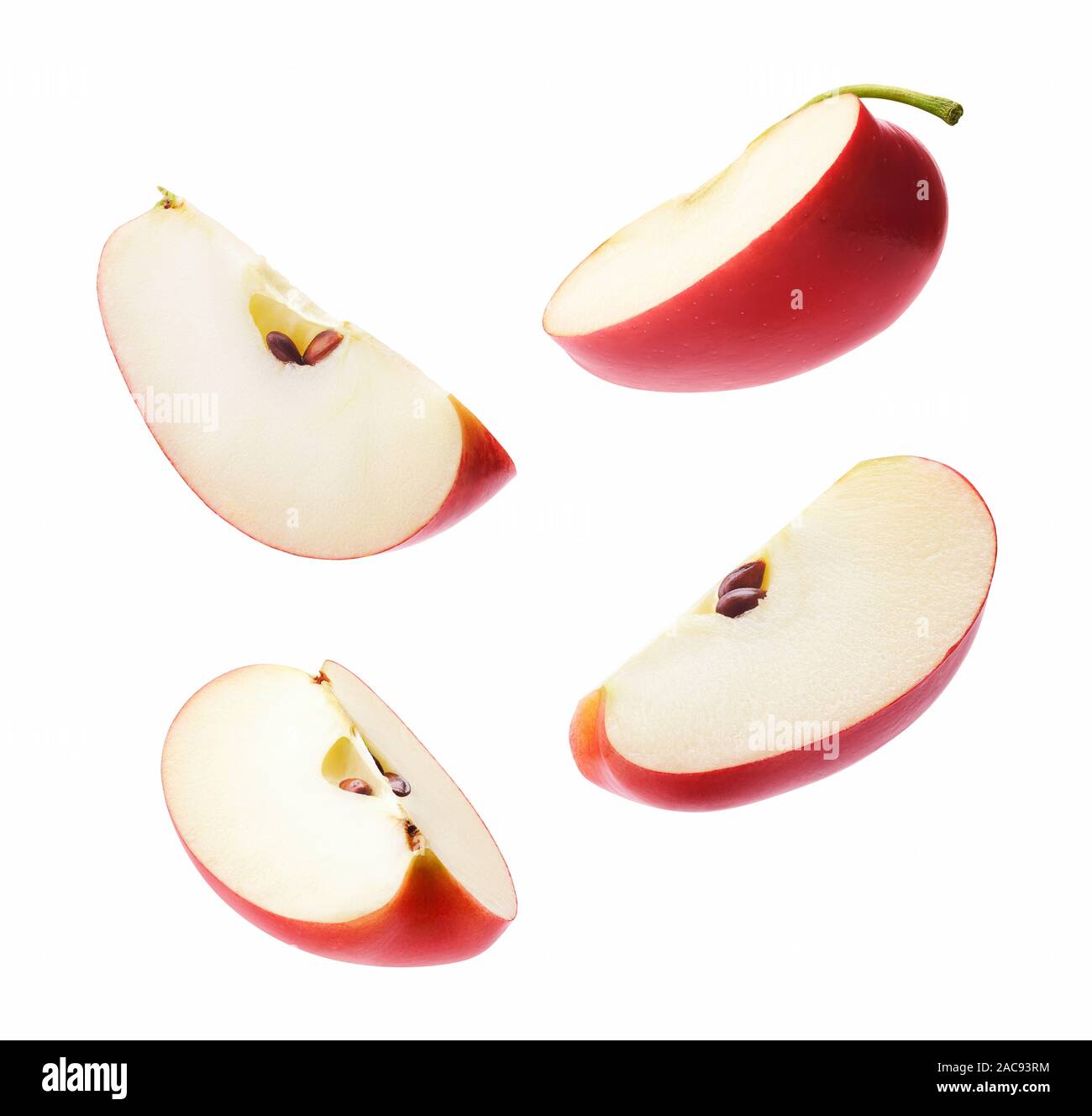 Autre angle de tranches de pomme rouge isolé sur fond blanc Banque D'Images