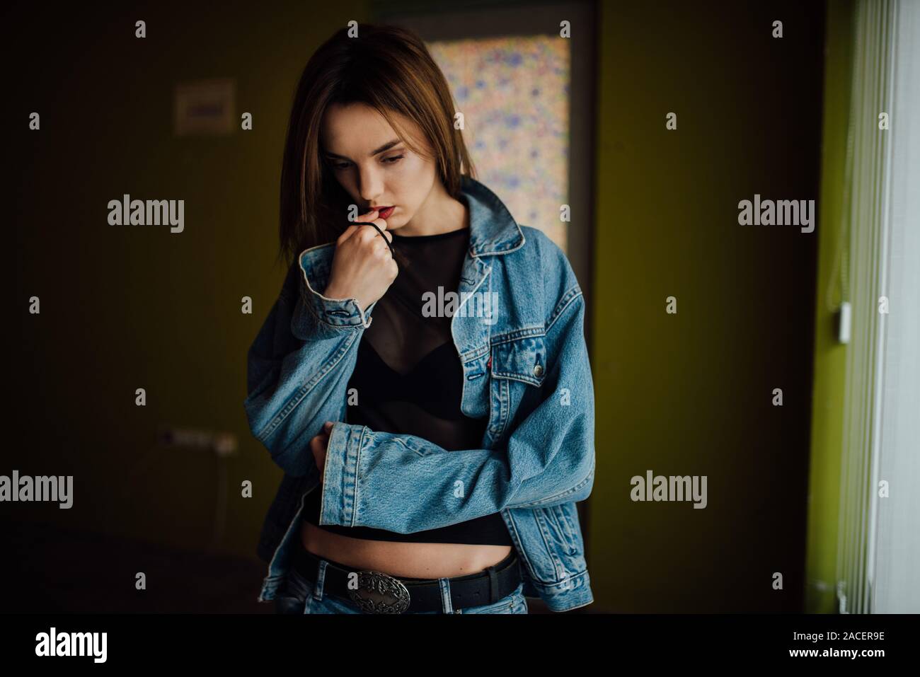 Portrait of a young Beautiful woman in denim jacket Banque D'Images