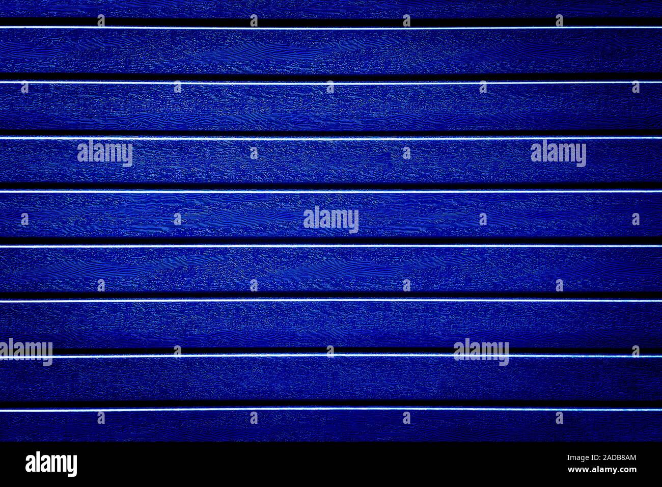 Ton bleu foncé fond texture bois artificiel mur abstraction Banque D'Images