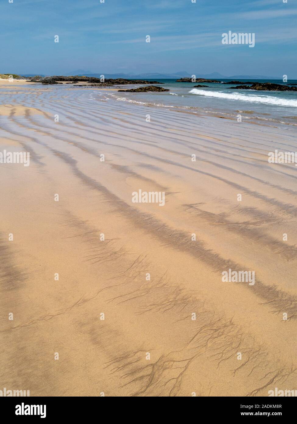 Étendue de sable propre et belle, les vagues de l'océan, Balnahard beach, à l'île de Colonsay dans les Hébrides intérieures, Ecosse, Royaume-Uni Banque D'Images