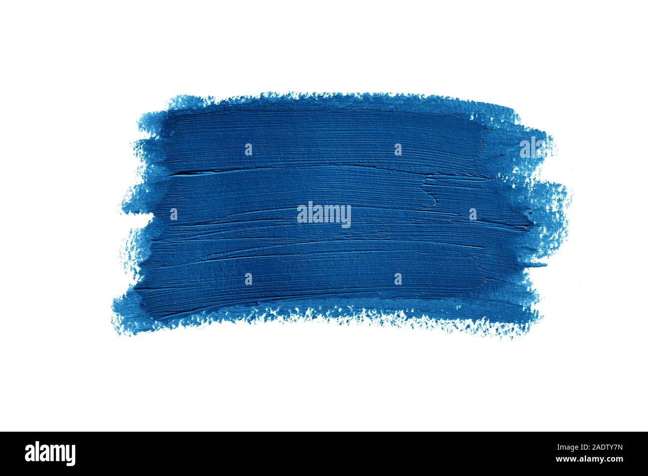 Enduire de peinture bleu Gros plan isolé sur fond blanc. Banque D'Images