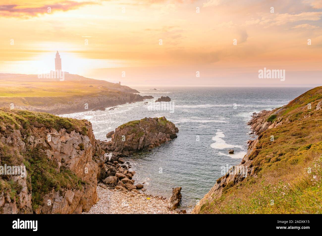 L'Espagne, la Galice, La Corogne. Torre de Hercules au coucher du soleil Banque D'Images