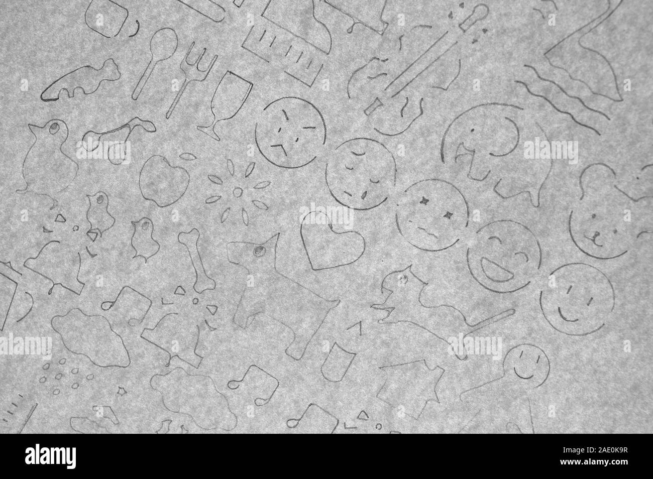 Dessiner au crayon l'icône et un émoticône Banque D'Images