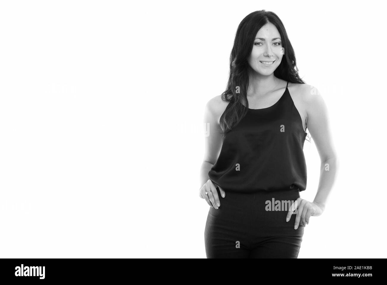 Studio shot of young businesswoman smiling while posing Banque D'Images