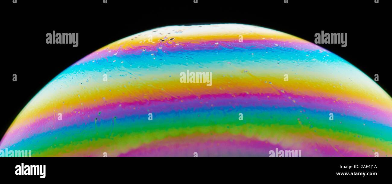 De la courbe de bulle de savon coloré vue macro close up Banque D'Images