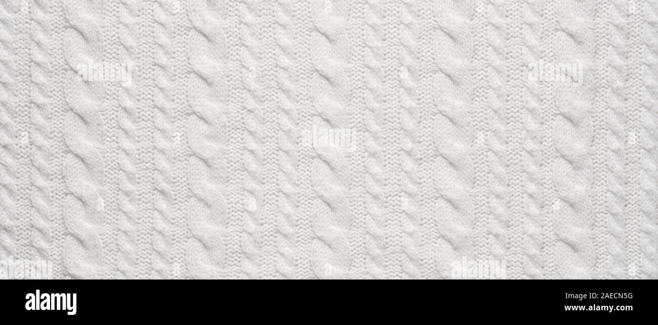 Tricot blanc Arrière-plan. La texture de laine Close Up Banque D'Images