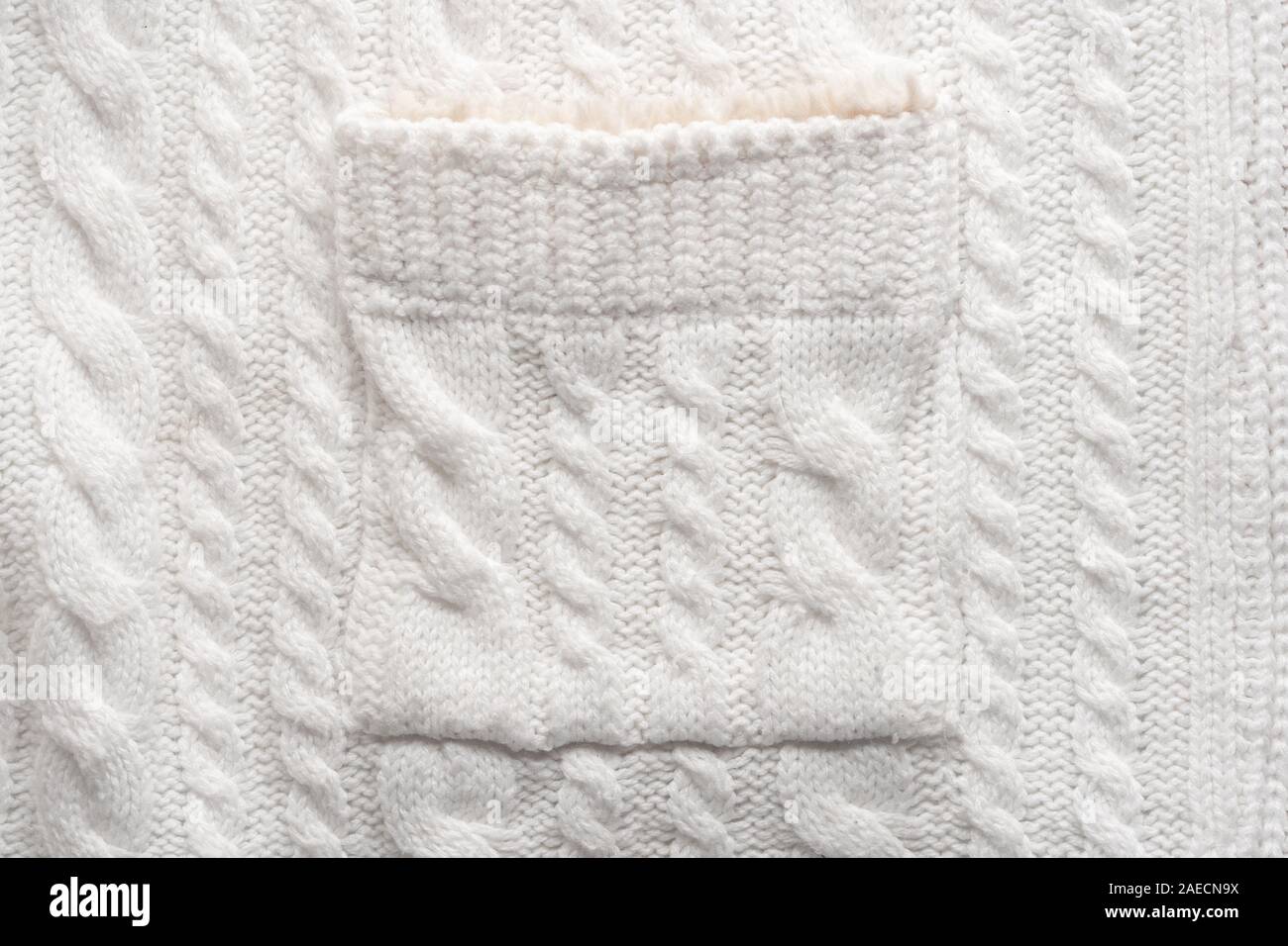 Tricot blanc Arrière-plan. La texture de laine Close Up Banque D'Images