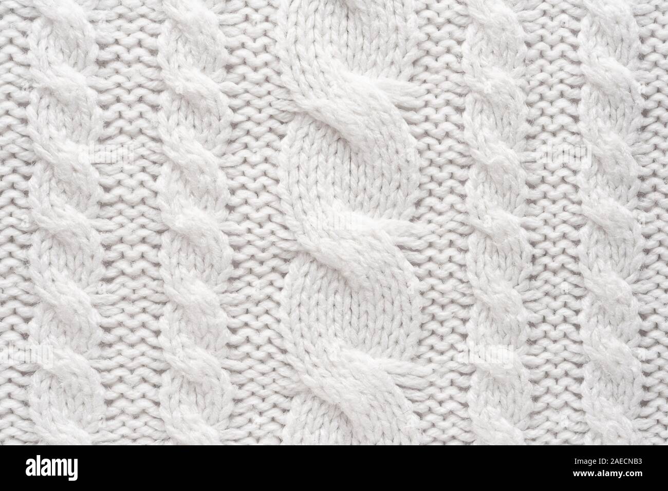 Tricot blanc Arrière-plan. La texture de laine Close Up Banque D'Images