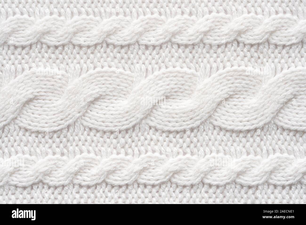 Tricot blanc Arrière-plan. La texture de laine Close Up Banque D'Images