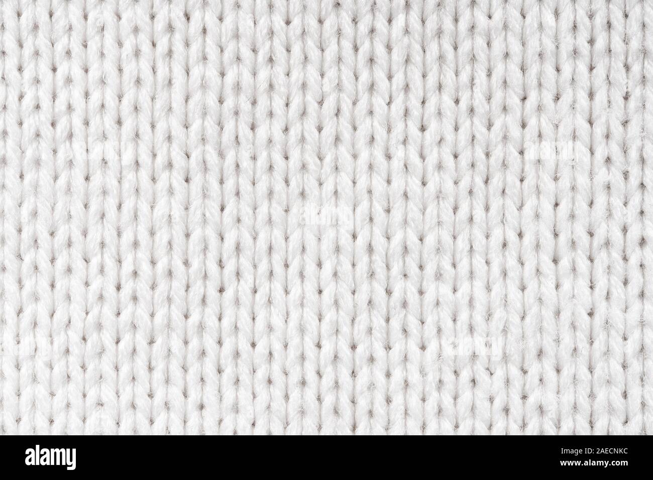 Tricot blanc Arrière-plan. La texture de laine Close Up Banque D'Images