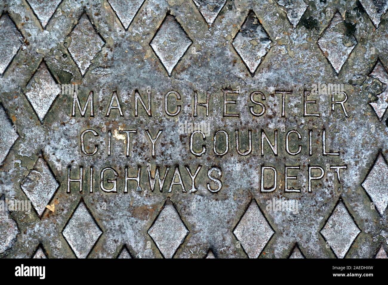 Manchester City Council Highways Dept, Manhole cover, Greater Manchester, Angleterre, Royaume-Uni Banque D'Images