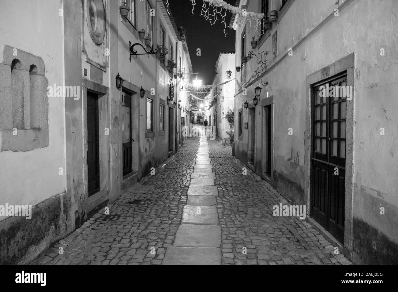 Maisons en bordure de rue dans une ville, district de Leiria, Obidos, Portugal Banque D'Images