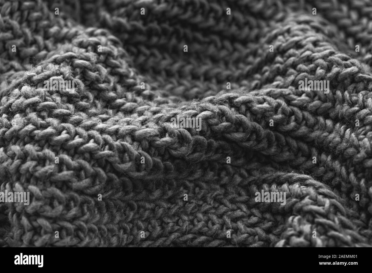 Tricot monochrome libre. La laine tricotée arrière-plan. Fait main. Close up. Banque D'Images