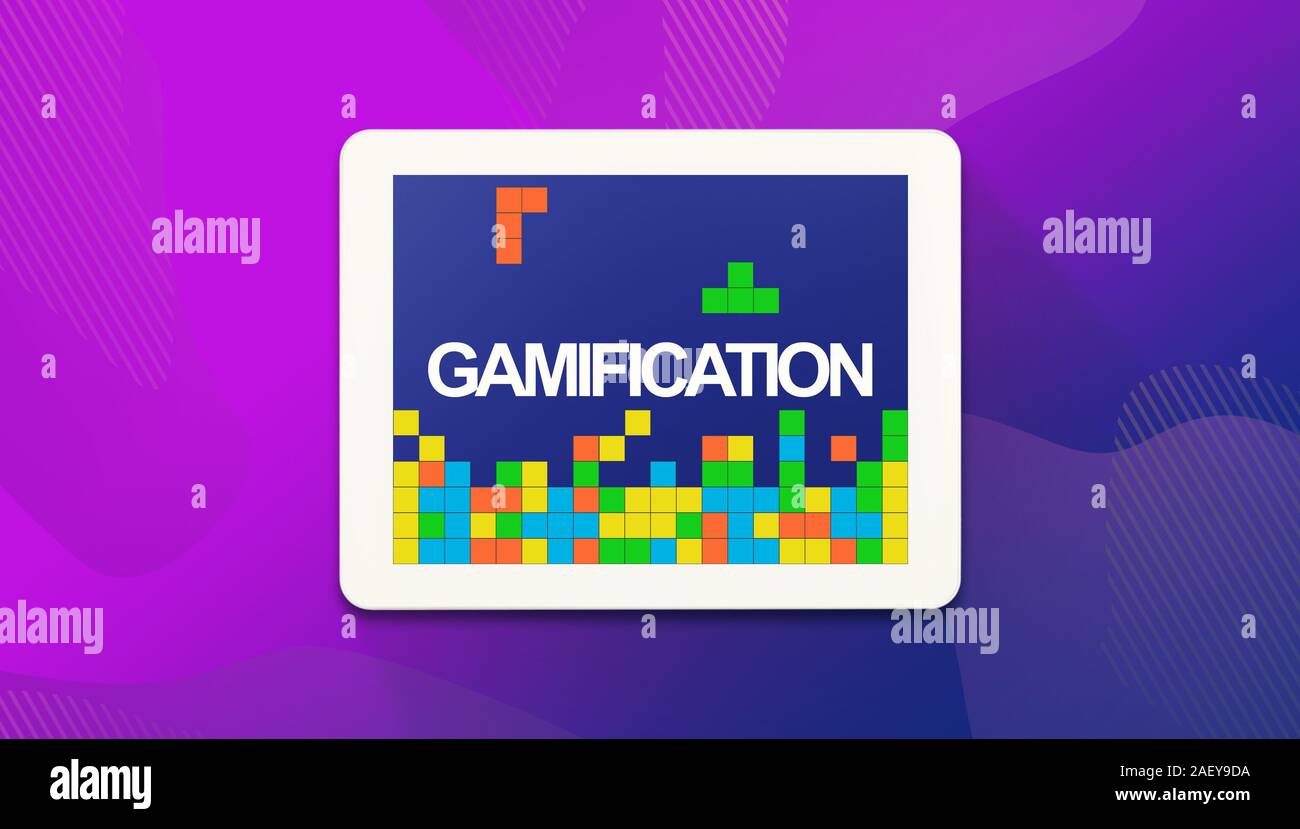 Avec tablette numérique jeux vidéo rétro et mot Gamification sur écran, purple background panorama Banque D'Images