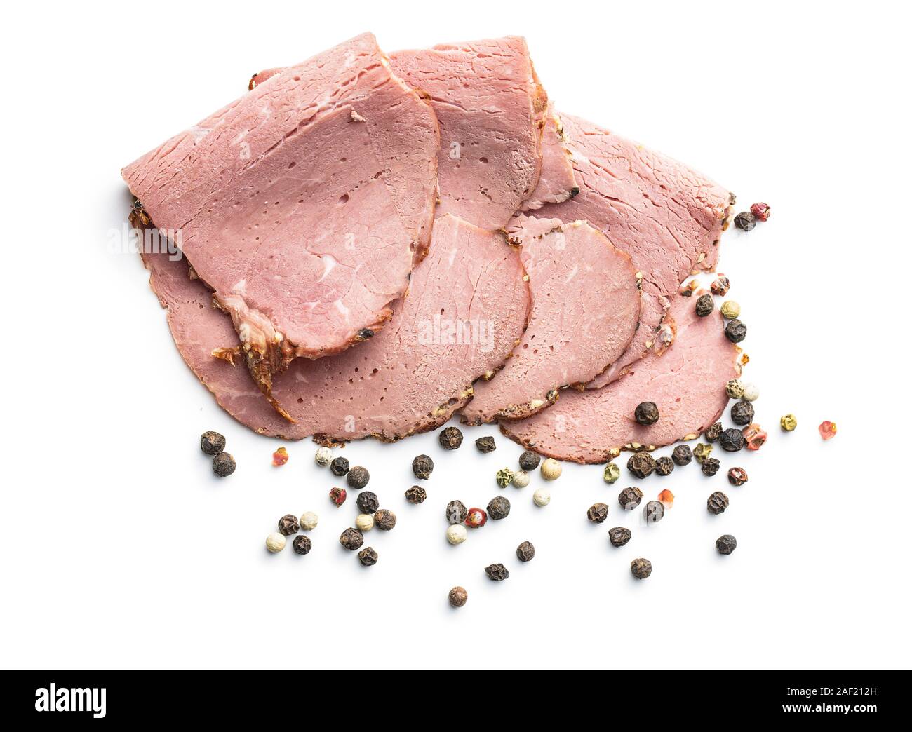 Tranches de rôti de boeuf et son ensemble de poivre. La viande fraîche savoureux isolated on white backgrund. Banque D'Images