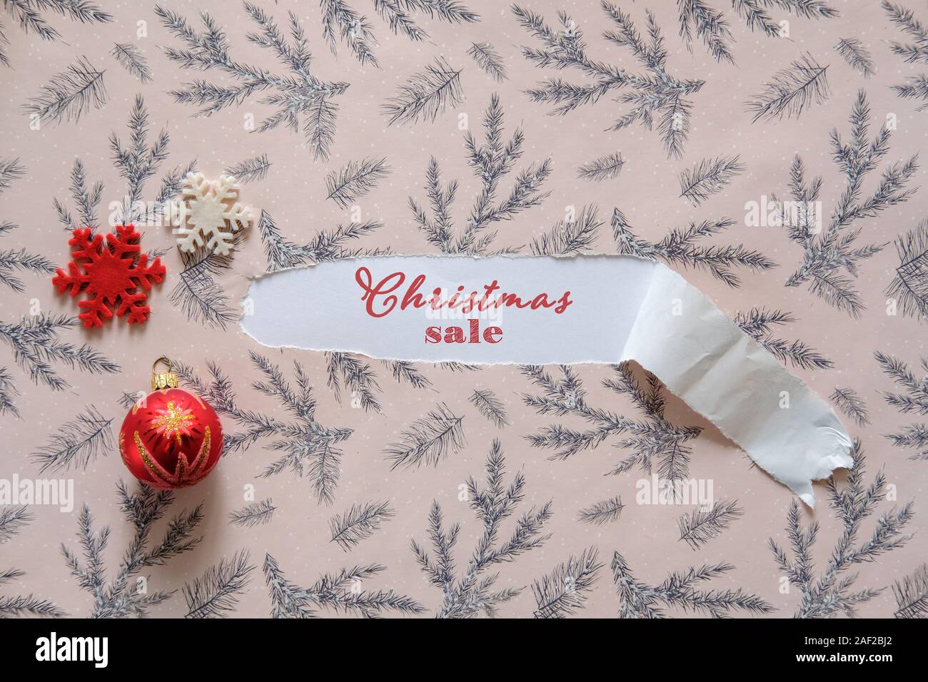 Texte « Christmass Sale » sur le fond du papier d'emballage de Noël. Vente de Noël fond d'écran, papier peint, dépliants, invitation, affiches, brochure, bannière. Banque D'Images