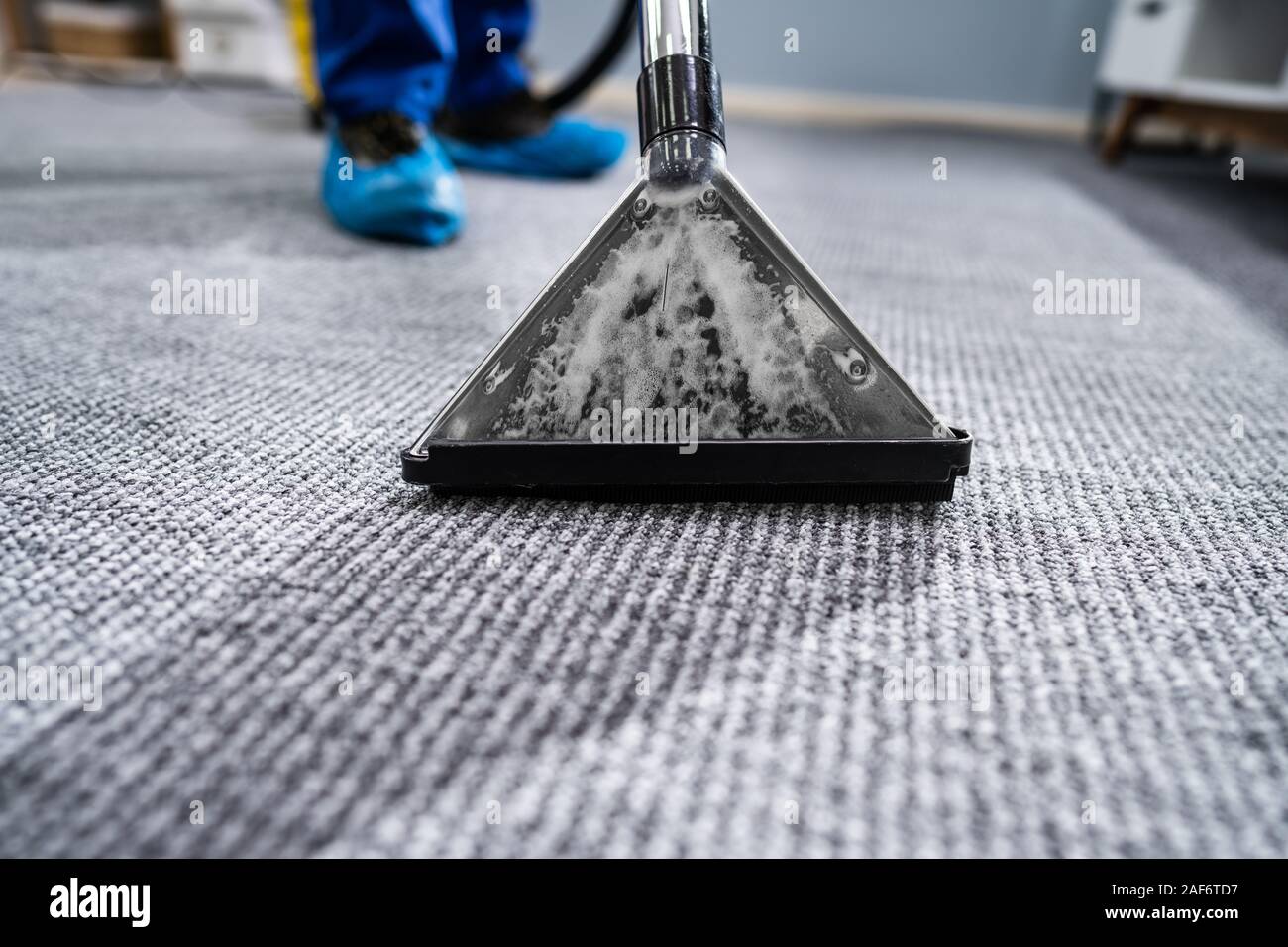 Close-up d'un tapis de Nettoyage avec aspirateur Banque D'Images