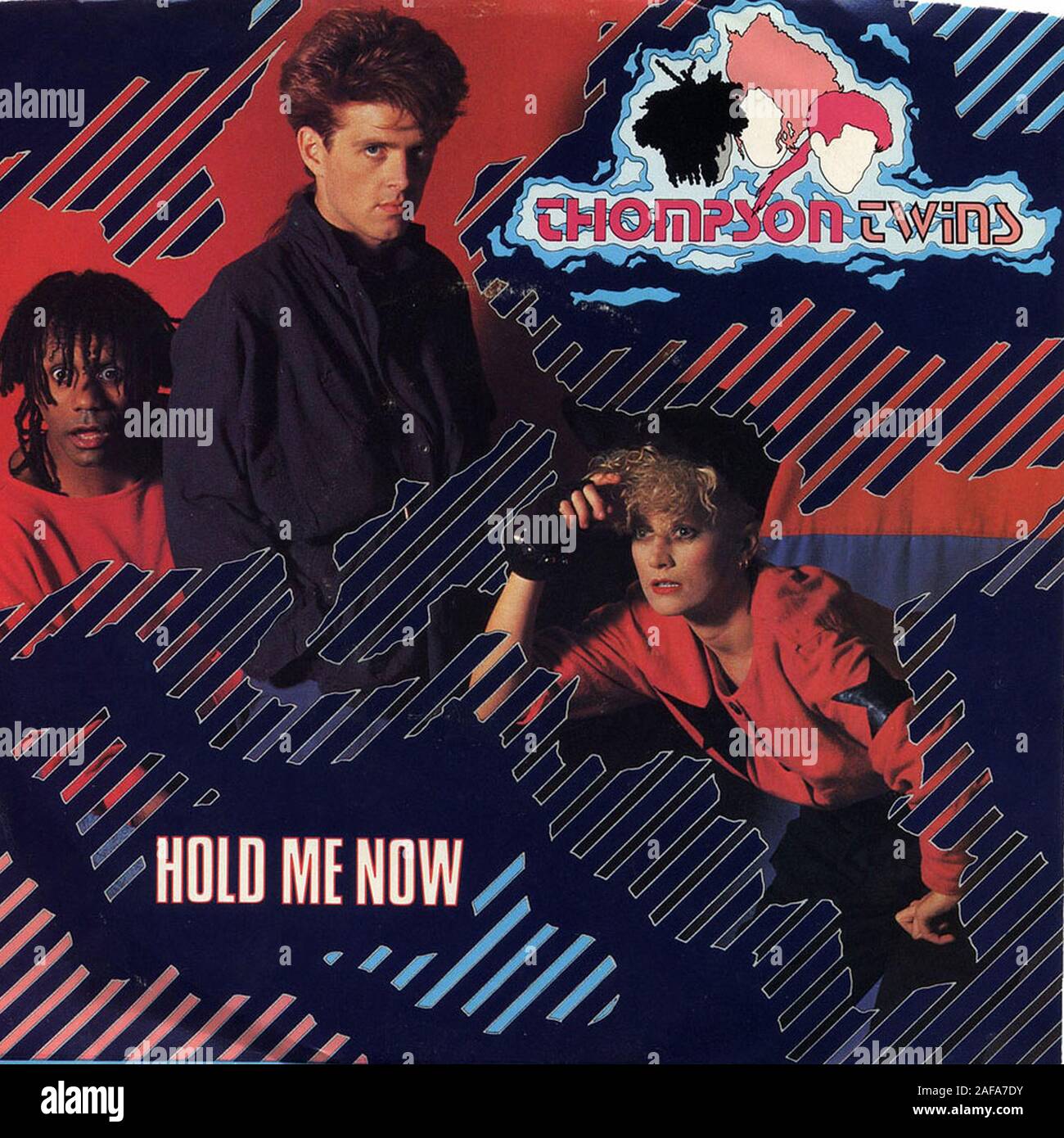 Thompson Twins - Hold me Now - couverture de l'album vinyle vintage Banque D'Images