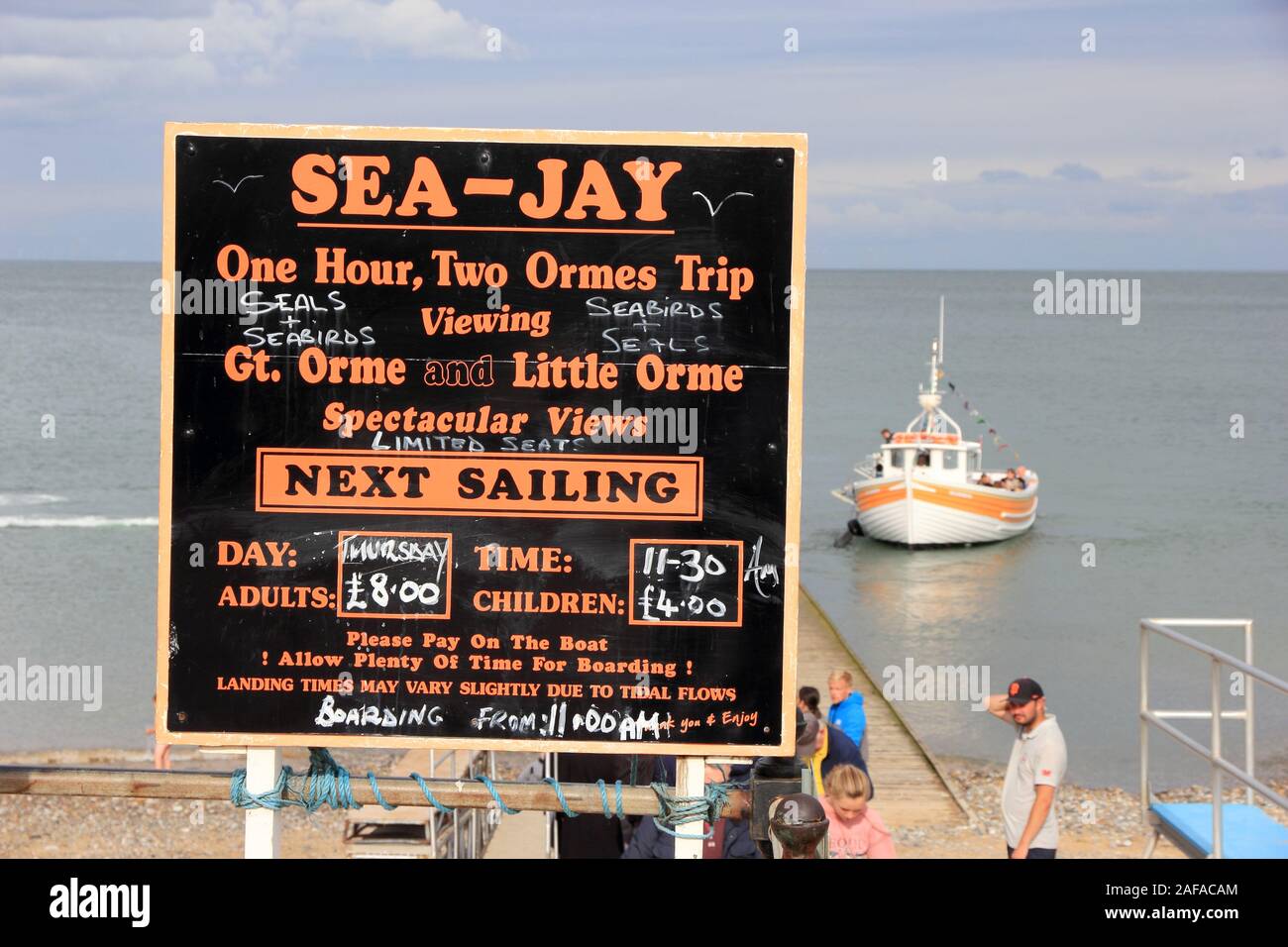 Publicité inscription excursions en bateau autour de bay, Llandudno Banque D'Images