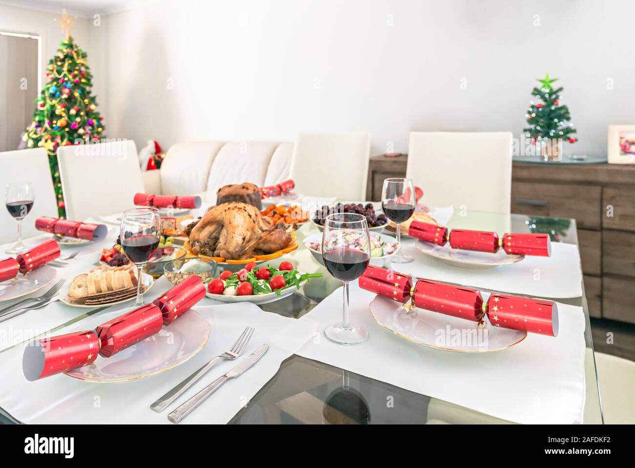 Famille australienne table de dîner de Noël vinaigrette avec la Turquie Banque D'Images