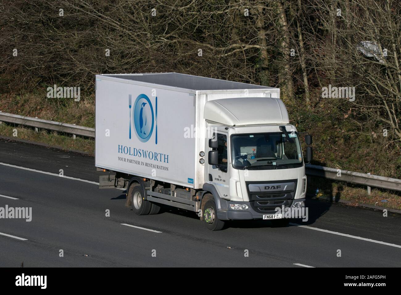 Holdsworth DAF camion conduisant sur l'autoroute M61, près de Manchester, Royaume-Uni Banque D'Images Holdsworth DAF camion conduisant sur l'autoroute M61, près de Manchester, Royaume-Uni Banque D'Images