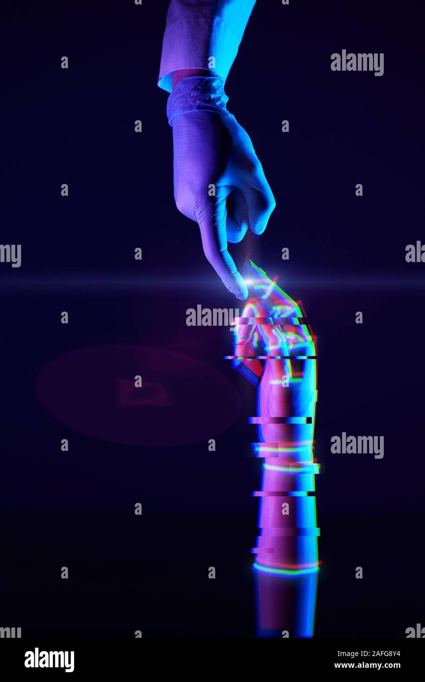 Les doigts de toucher de l'ingénieur et de la technologie numérique qu'il crée. Connaissance de l'homme et de la technologie. Concept futur. Banque D'Images