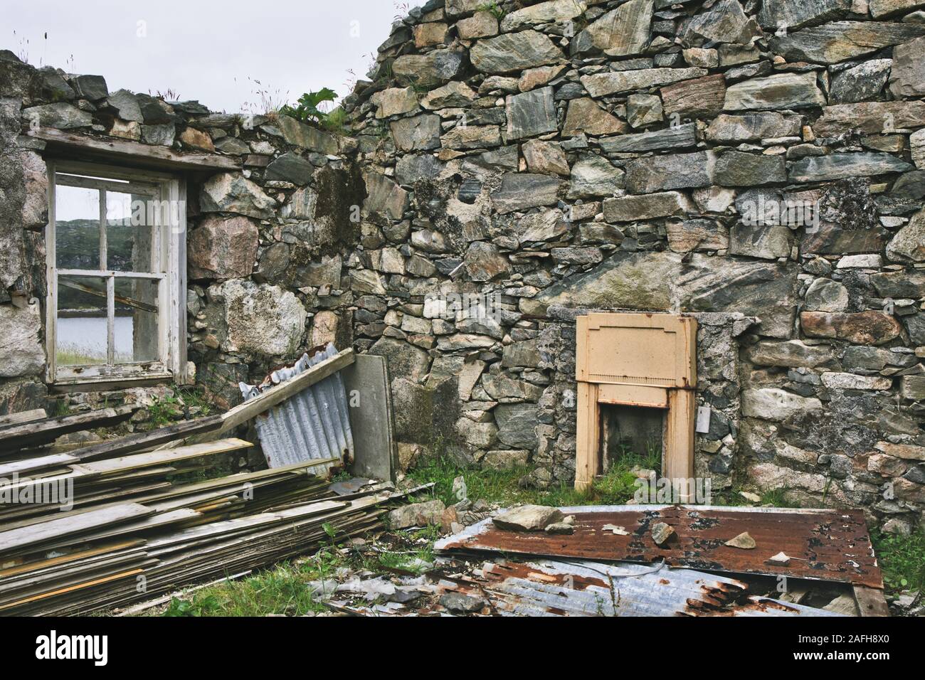 Foyer dans les maisons de crofters abandonnées, île de Lewis et Harris, Outer Hebrides, Écosse Banque D'Images