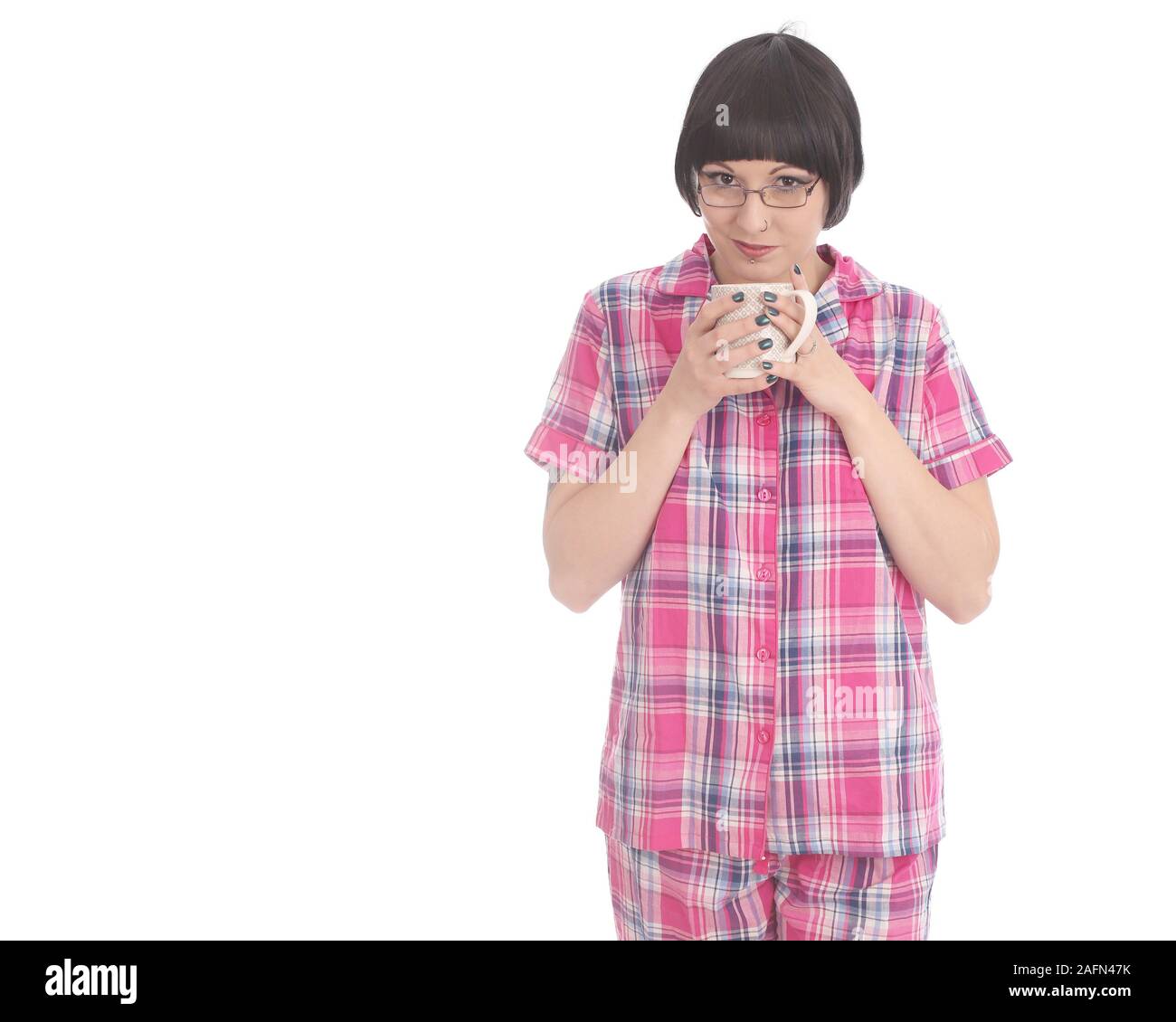 Mai 2015 - Jeune femme dans son pyjama prêt pour le lit Banque D'Images