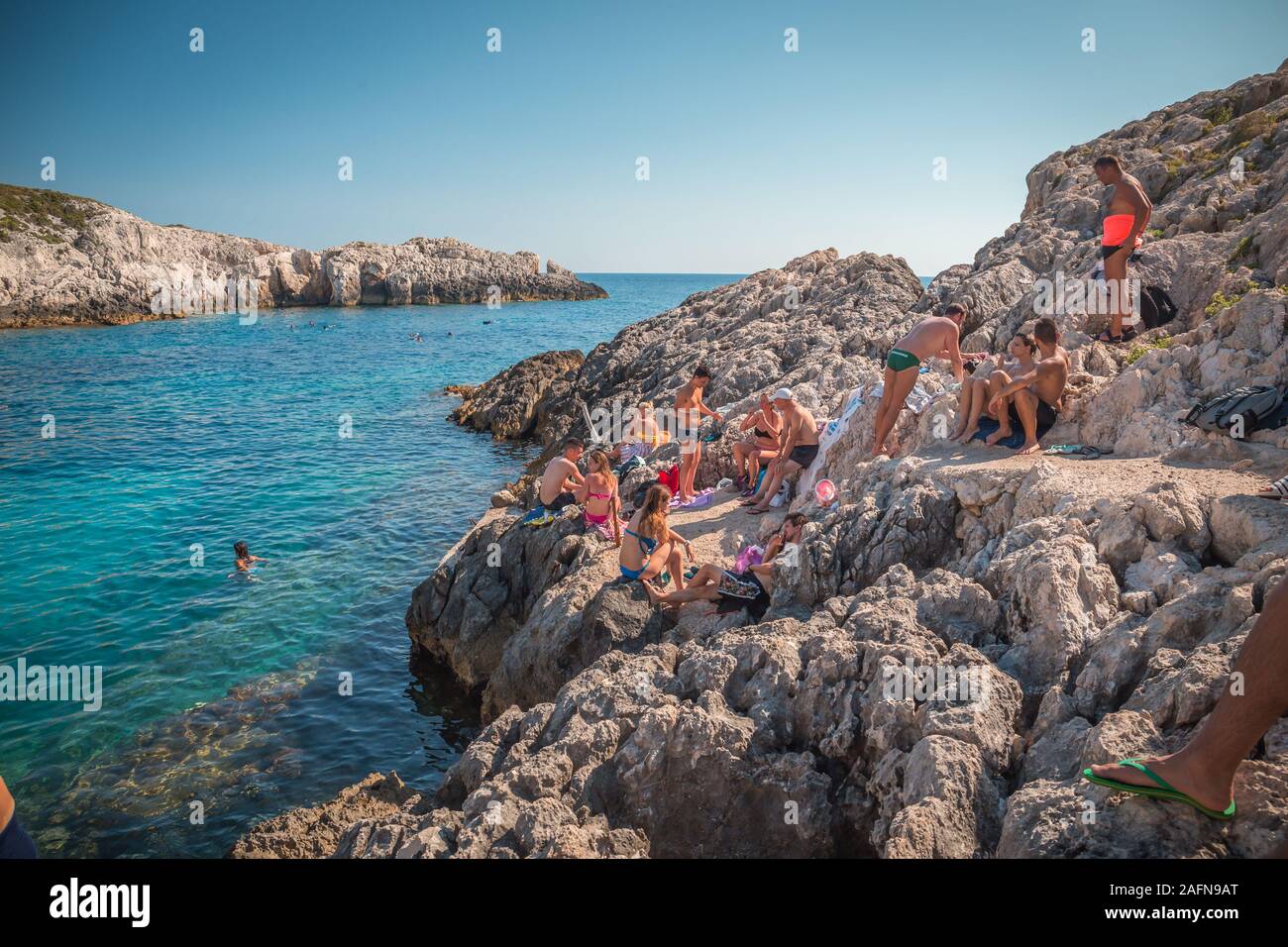 Zakynthos, Grèce, Août 2019 - Porto plage de Limnionas sur l'île de Zakynthos, Grèce. L'eau claire avec des pierres. Nice pour le snorkling et relaxant. Tout comme Banque D'Images