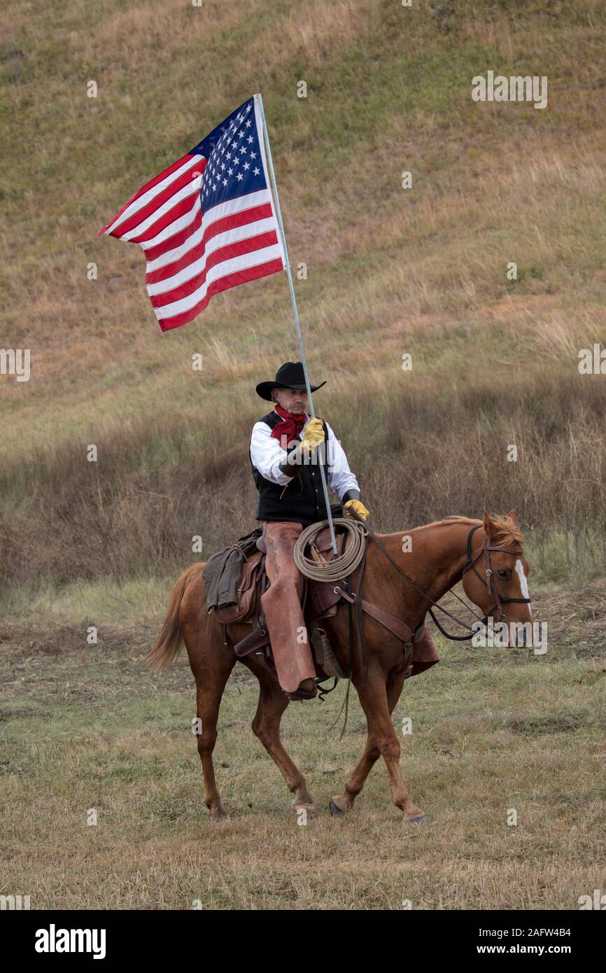 27 SEPT 2019, Custer State Park, South Dakota, USA - cowboys et cowgirls nous transporter d'un drapeau au congrès annuel de Custer State Park Buffalo Roundup Banque D'Images