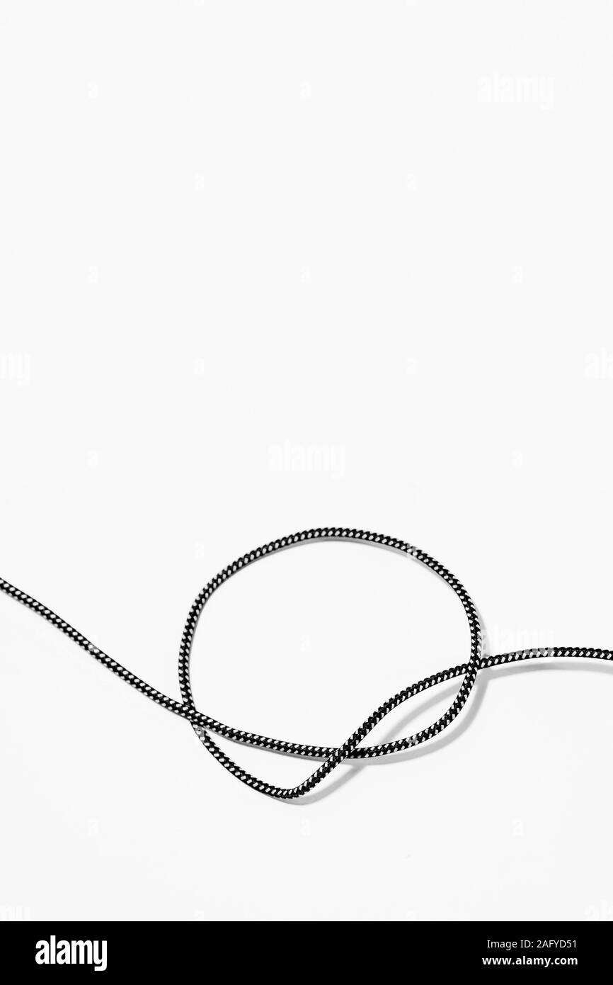 Le noeud simple sur fond blanc Banque D'Images