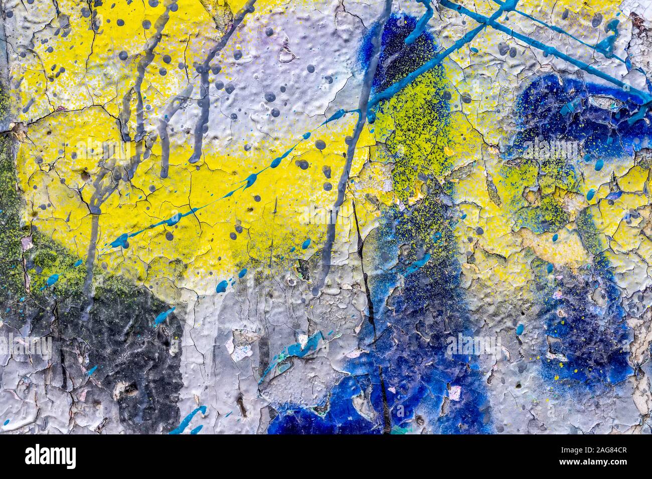 Fragment de graffitis colorés peints sur un mur de béton. La texture. Résumé fond pour la conception. Banque D'Images