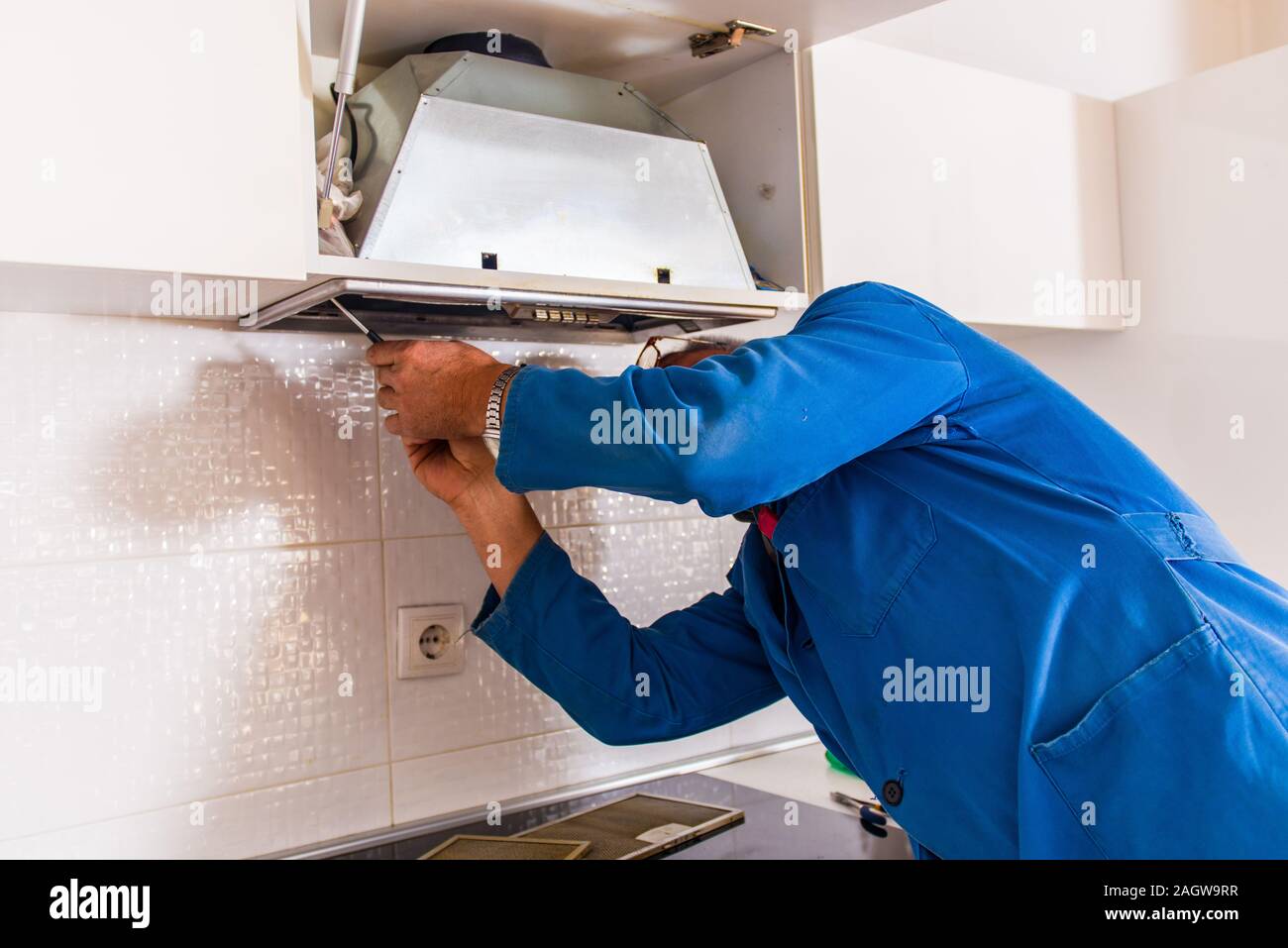 Réparateur de maturité uniforme bleu de l'iin est de fixer la ventilation de cuisine Banque D'Images