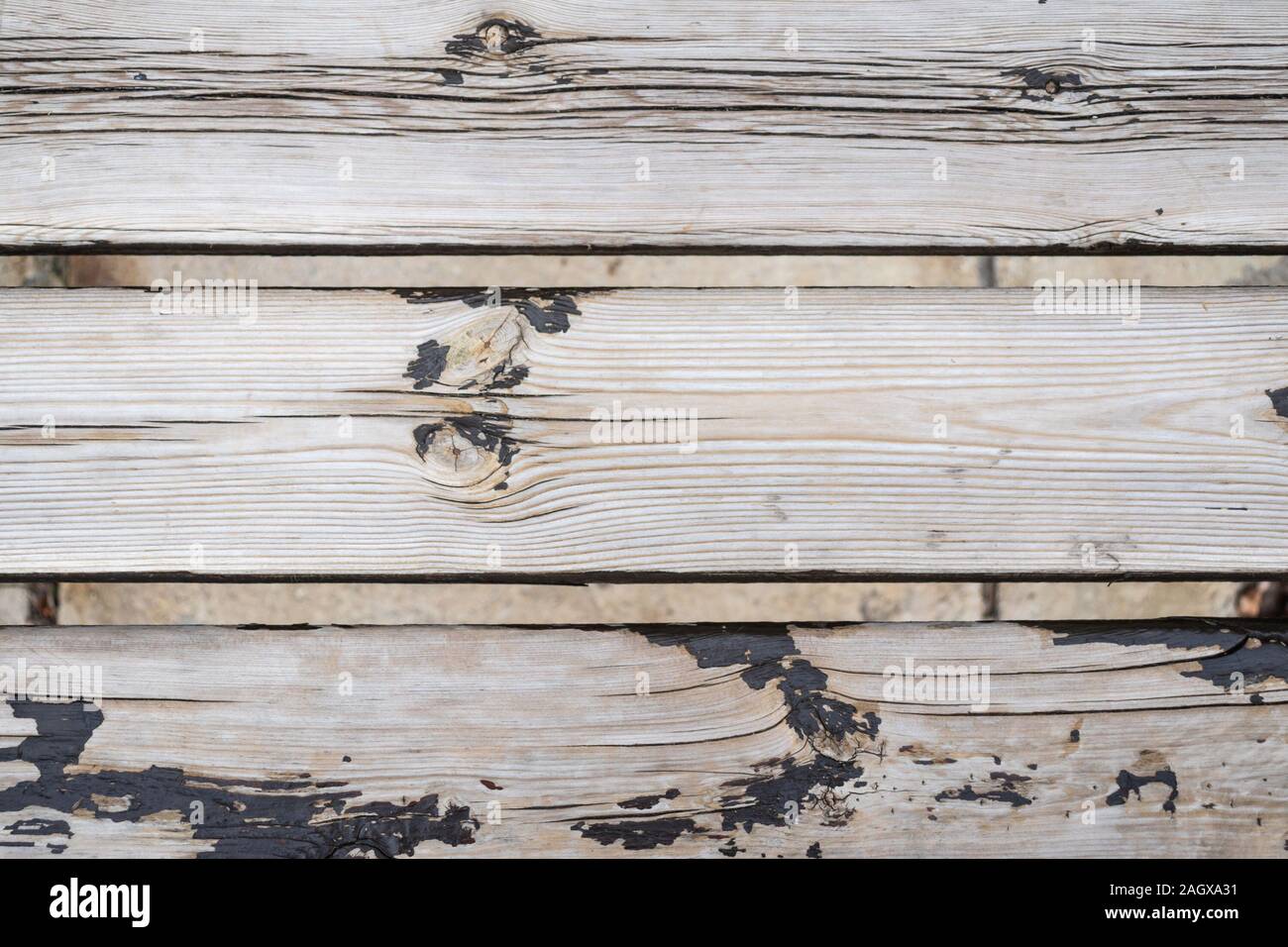 Vieux bois grunge texture d'un banc extérieur Banque D'Images