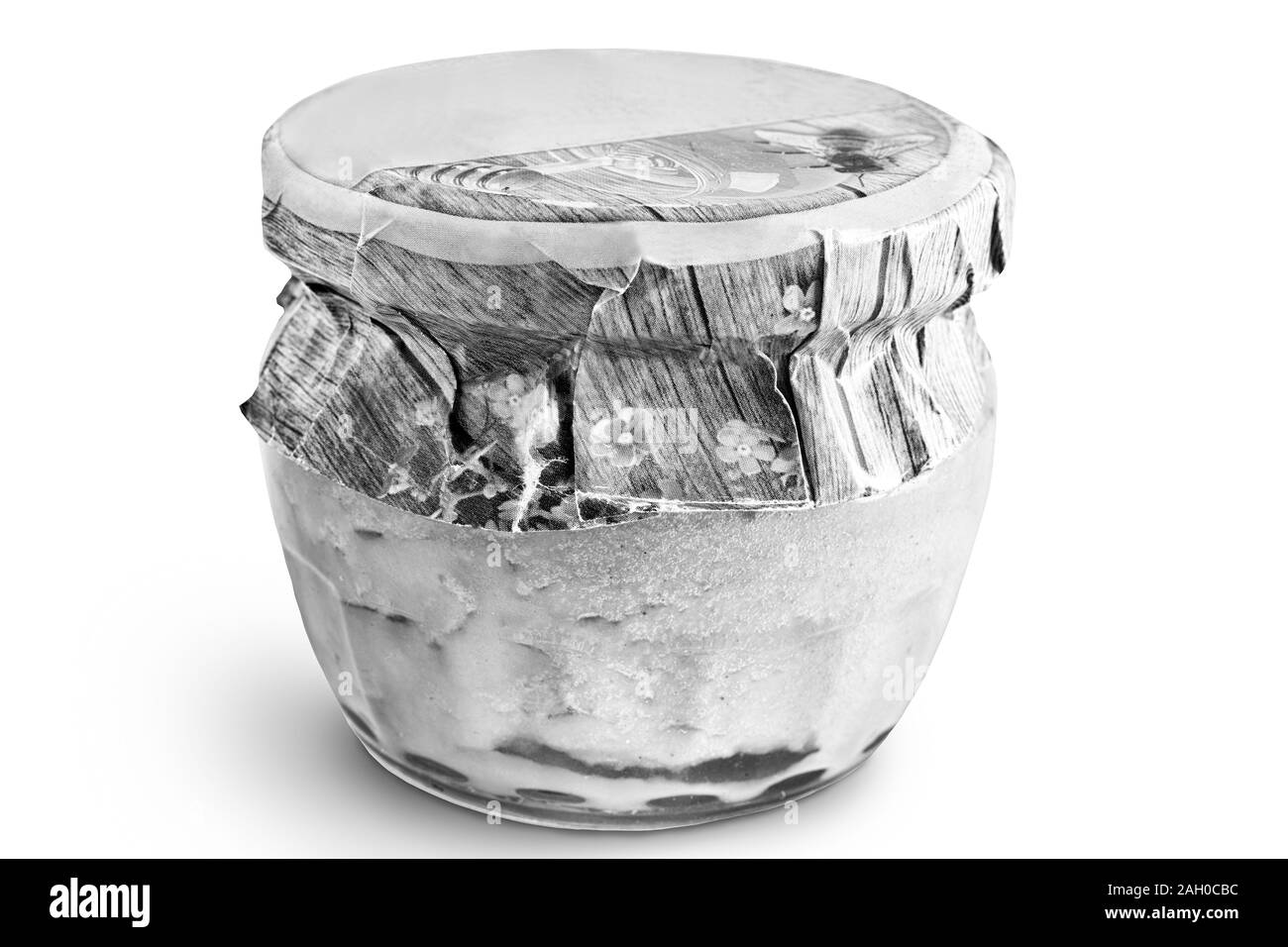 Produit de l'Apiculture : propolis avec du miel dans un pot de verre. Banque D'Images