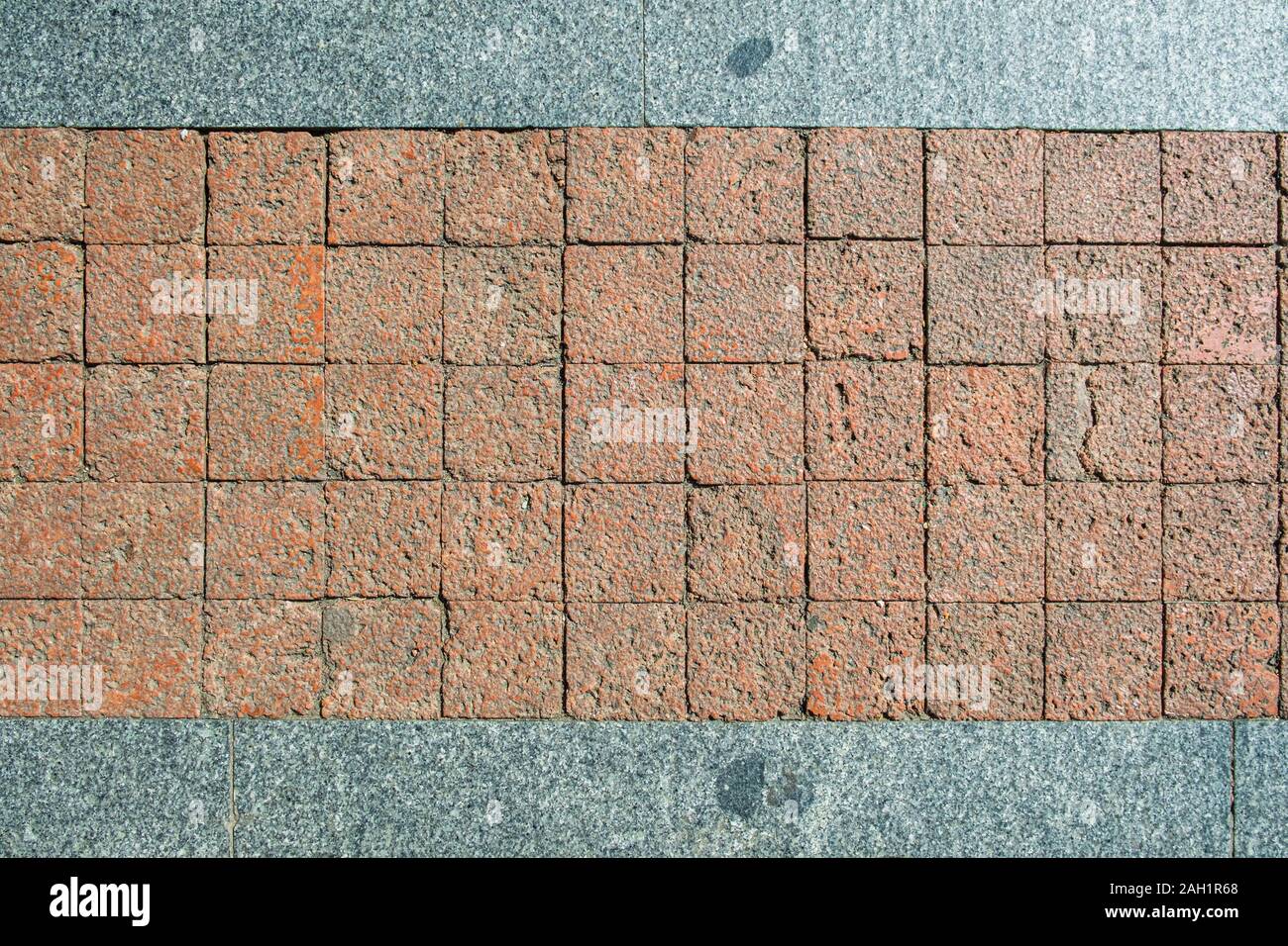 La texture de marbre close up motif carré de ciment brique orange et gris en Banque D'Images