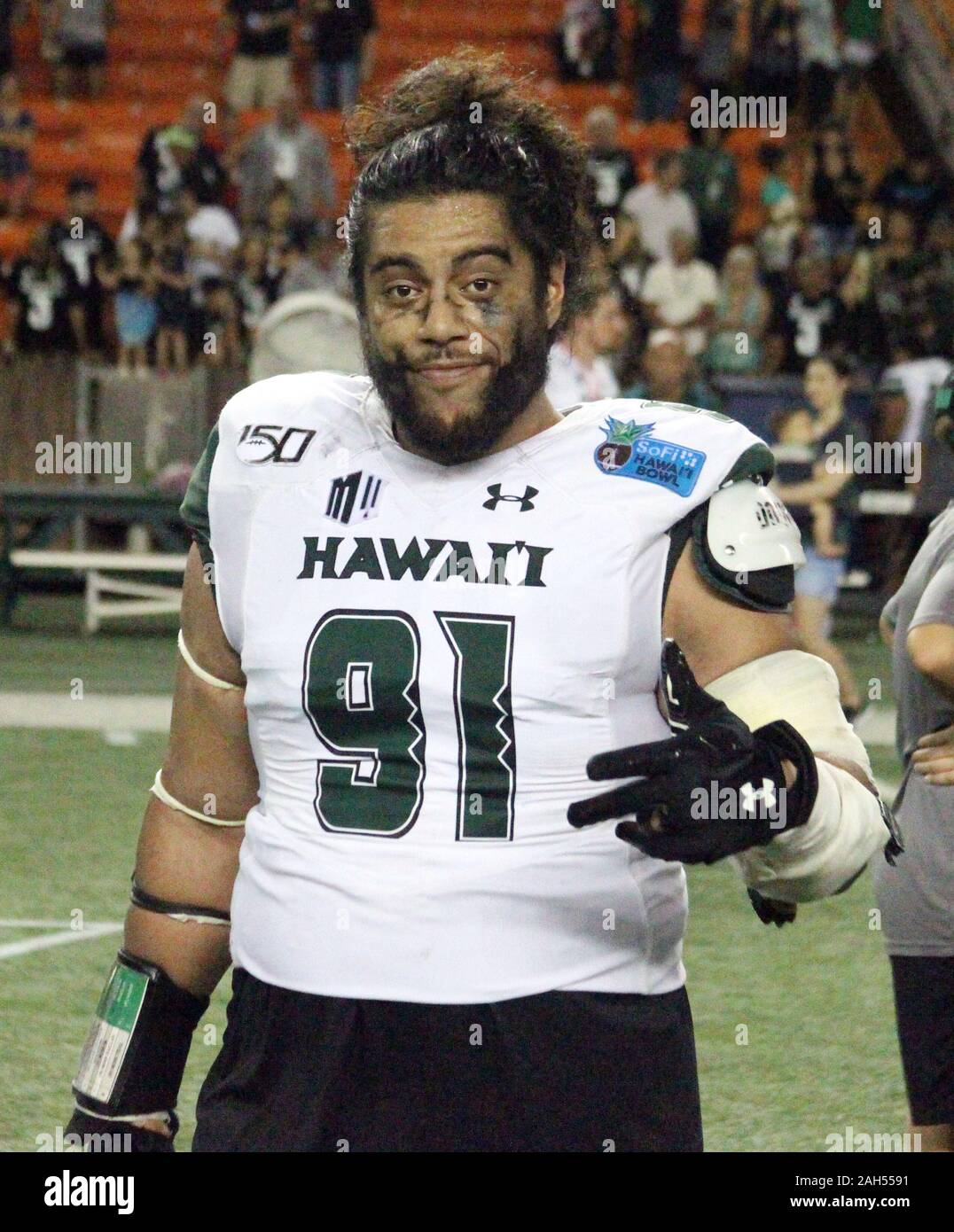 Honolulu, Hawaii, USA. Le 24 décembre, 2019. 24 décembre 2019 - Hawaii Rainbow Warriors joueur de ligne défensive Samiuela Akoteu (91) au cours d'une partie à la SoFi Hawaii Bowl entre les Cougars de Brigham Young et de l'Indiana Rainbow Warriors au shérif Stan Center à Honolulu, HI - Michael Sullivan/CSM. Credit : Cal Sport Media/Alamy Live News Banque D'Images