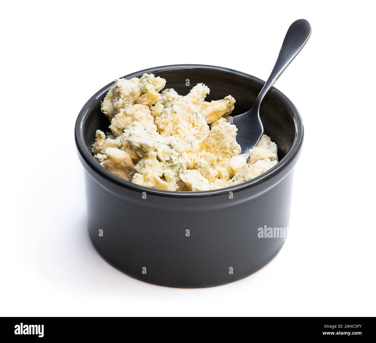D'âge en pot Blue Stilton cheese isolated on white Banque D'Images