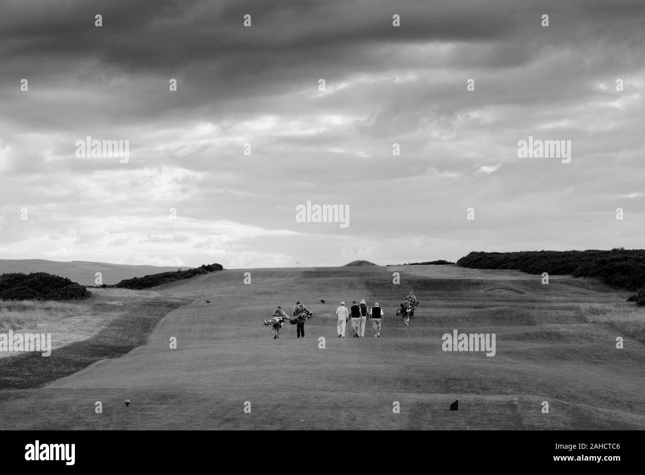 Les golfeurs sur le parcours ouvert au Royal Dornoch Golf Club en Ecosse Sutherland UK Banque D'Images