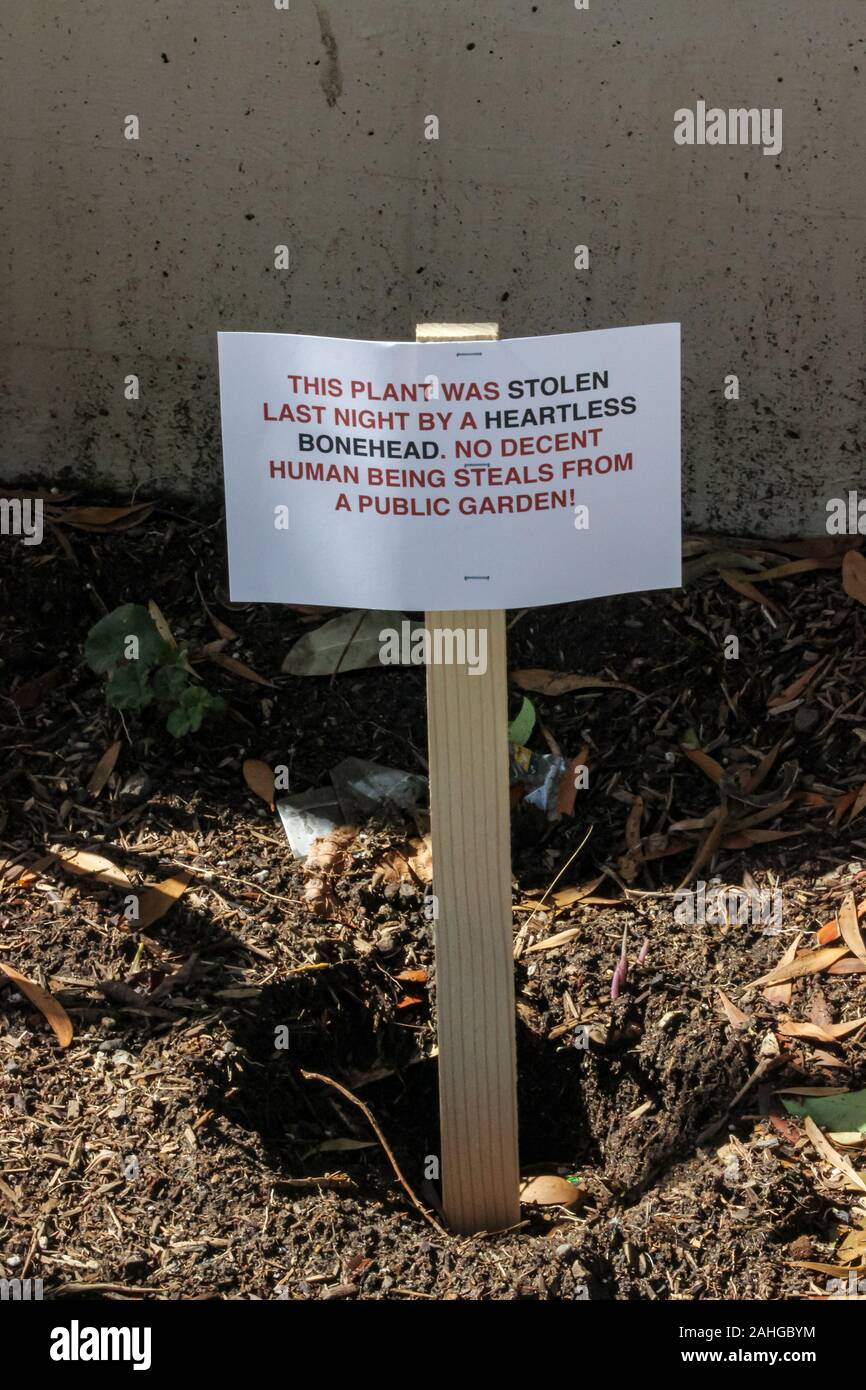 Placard de frustration dans un jardin public Banque D'Images