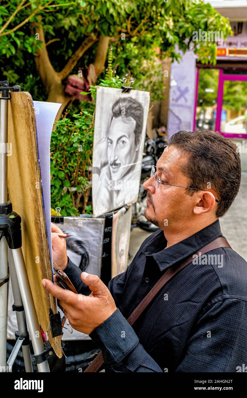 Artiste caricaturiste sur la route 9 à Maadi le Caire Banque D'Images